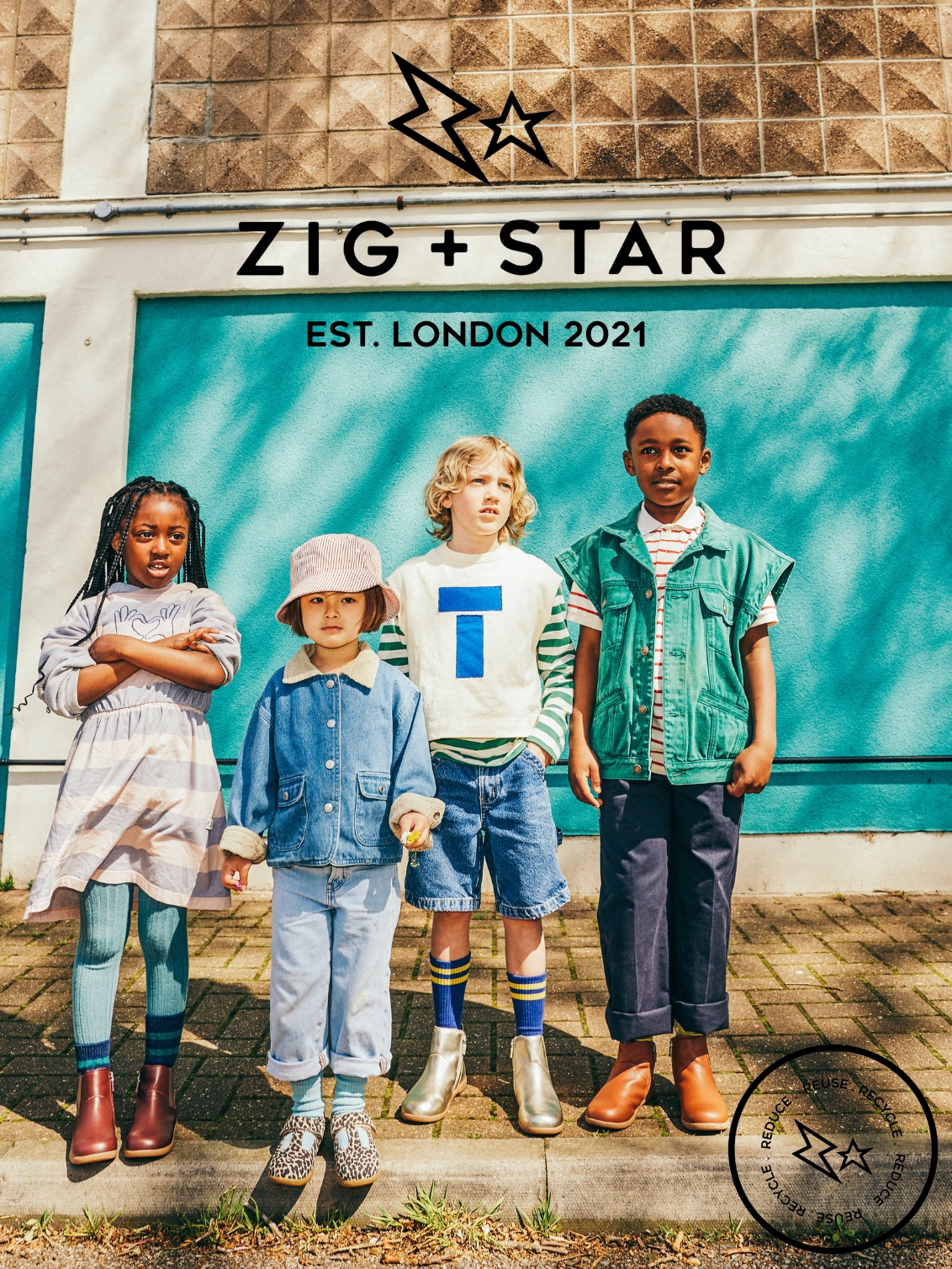 4 kids standing on pavement wearing ZIG+STAR KIDS shoes and boots