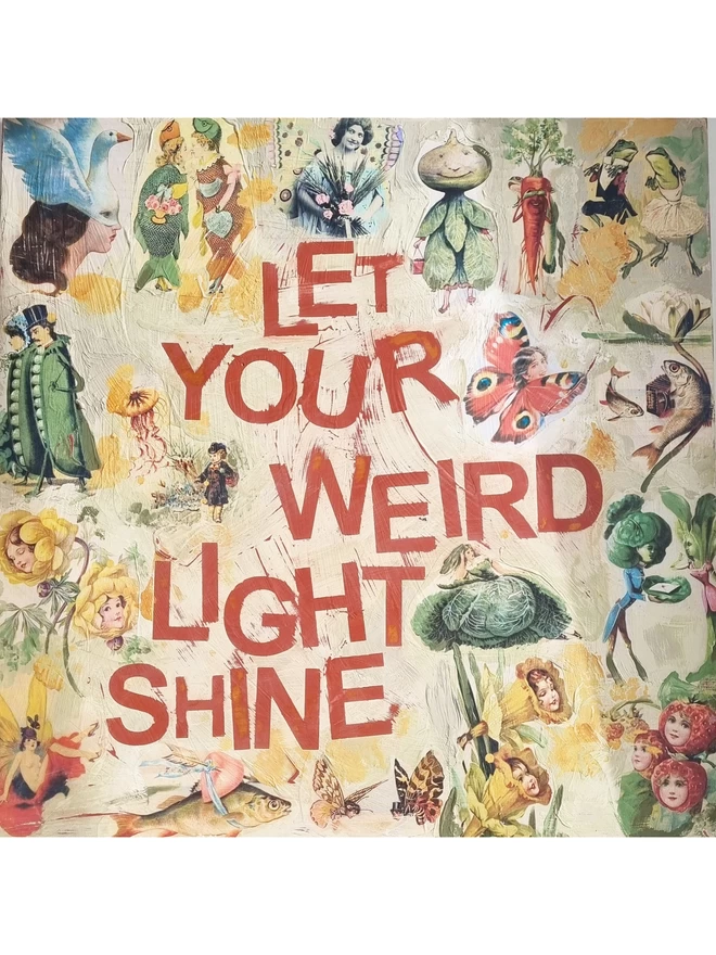 A large wall panel panted in creams with red text. A collage of Victorian greetings cards with the wording ‘let your weird light shine’. Humorous and quirky.