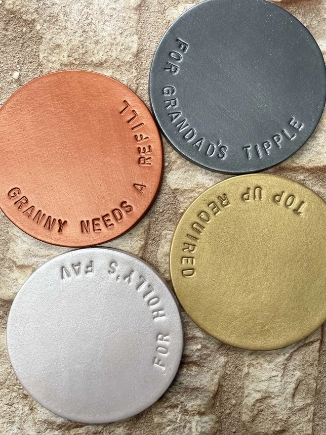 hand stamped leather coasters