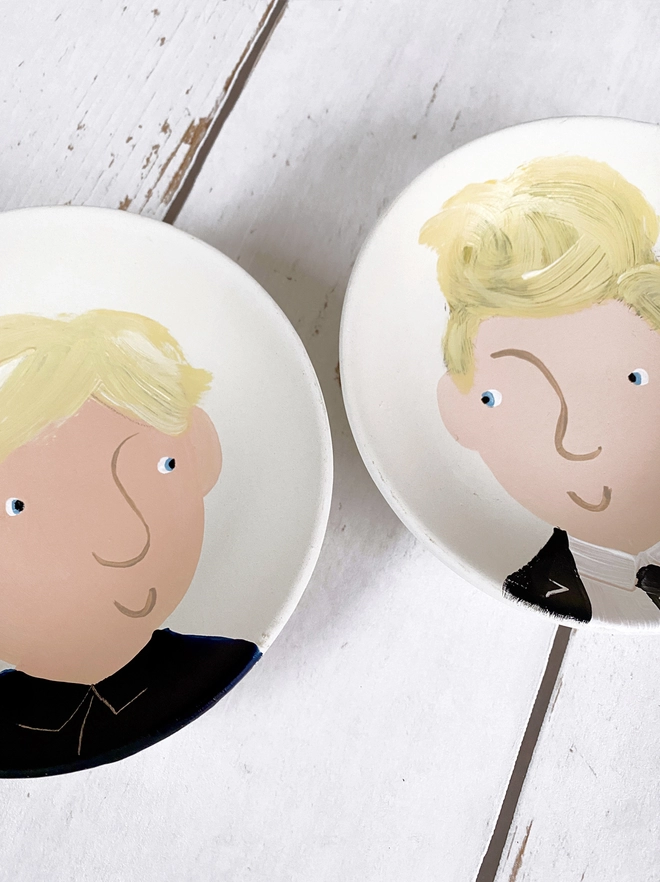 pair of plate portraits with blonde hair