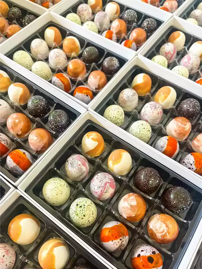 many different types of chocolates in a box.