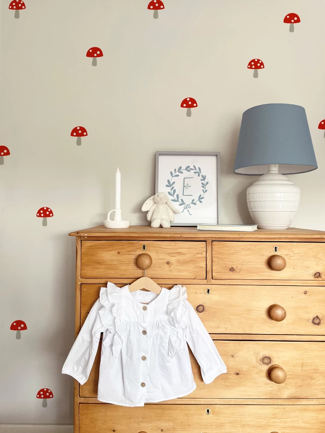 Toadstool Wall Stickers in baby nursery with drawers