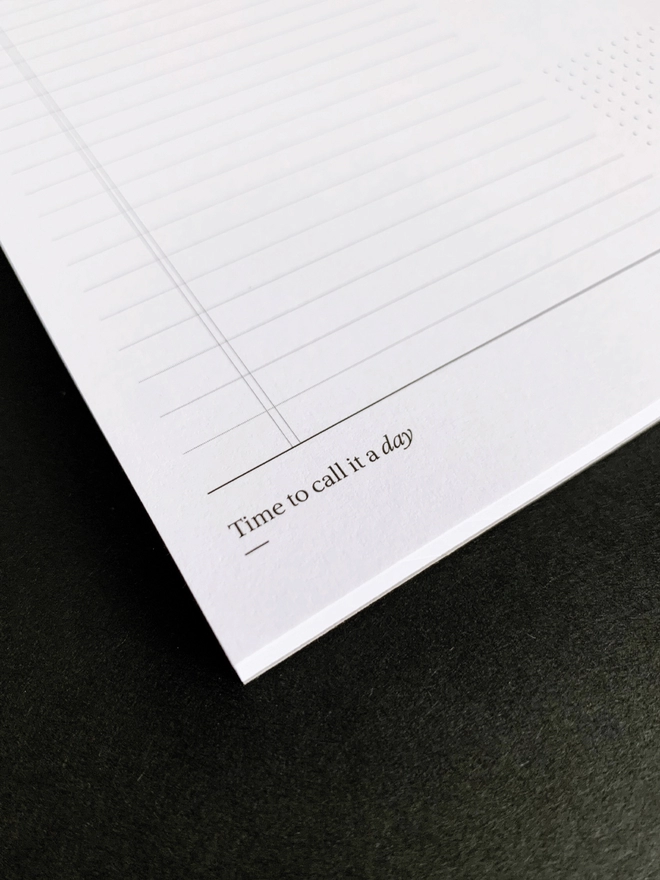 Close up of the quote at the bottom of the My Day pad that reads "Time to call it a day".