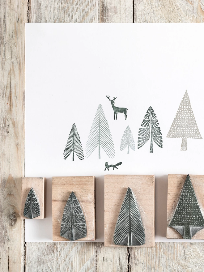 deer and fir tree wood stamps