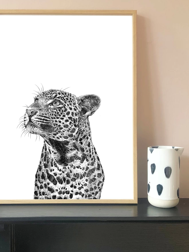 Art print of a Leopard shown in a frame