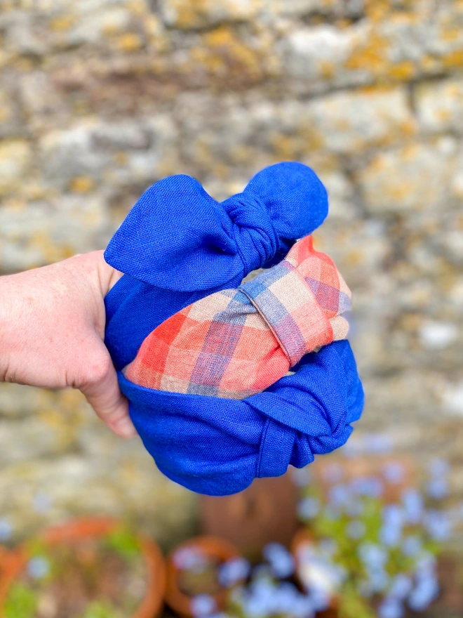 A beautiful handful of hairbands in cobalt blue and red check linen