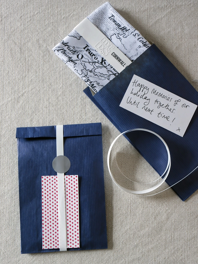 A Mr.PS Cornwall Map hankie with optional gift wrapping; navy paper, white ribbon and patterned gift card