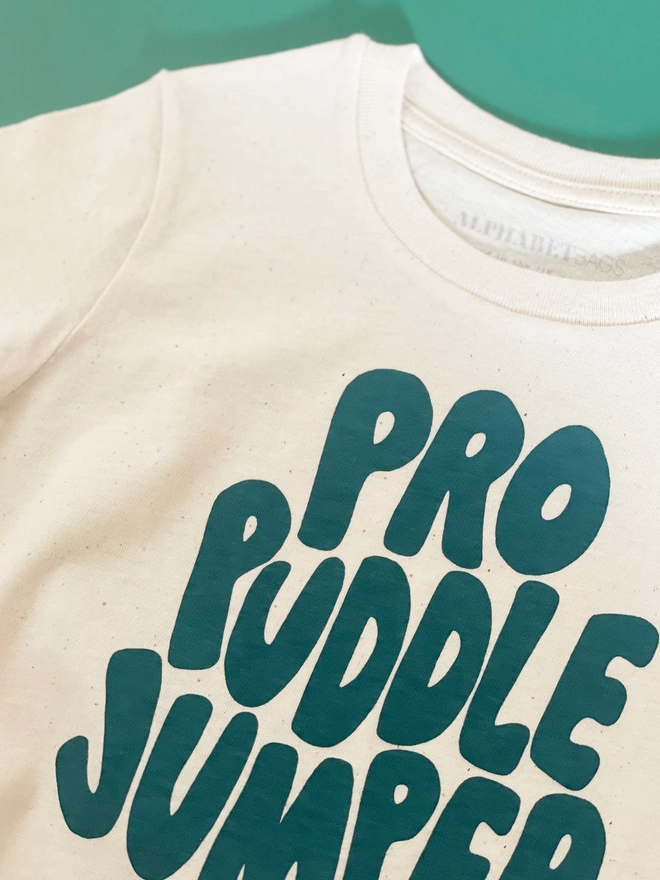 Close up of the organic flecked cotton of the pro puddle jumper kid's t-shirt