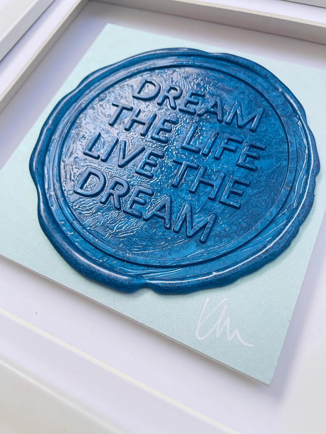     - [ ] Original artwork by Kate Mayer of the affirmation Dream the Life, Live the dream sealed in blue wax close up detail