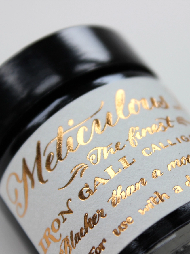 Meticulous Iron Gall Ink - Close up of foil printed label from the side
