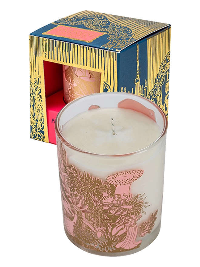 Angels of the deep neroli charity candle in a reusable glass with pink & gold illustrations next to box