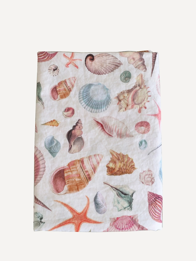 Linen tablecloth printed with shells