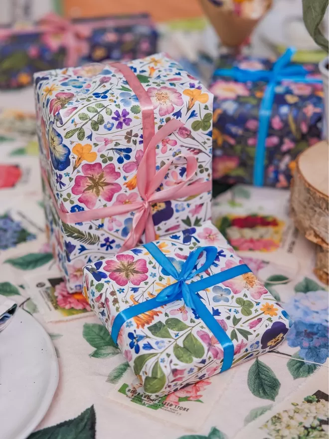 Gift wrapped in pretty pressed flower eco-friendly wrapping paper,
