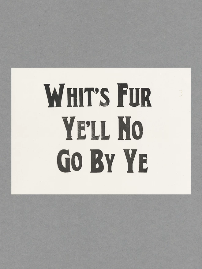 Poster with black text reading 'Whit's Fur Ye'll No Go Bo Ye' on white paper