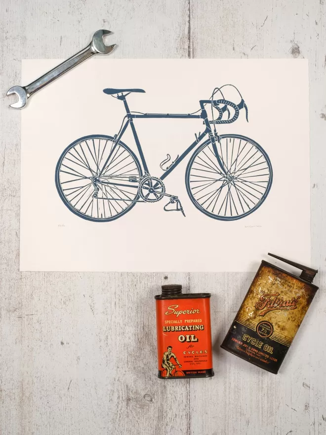 Picture of a Steel Framed Racing Bicycle, taken from an original Lino Print In Blue Black