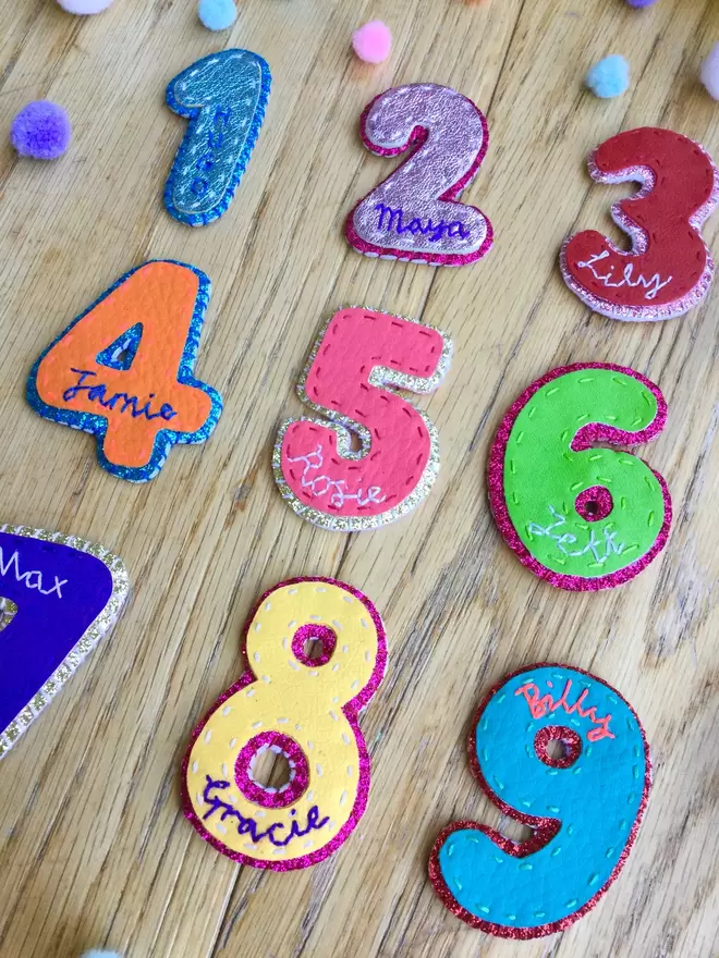 Hetty and Dave leatherette number brooches in bright colours