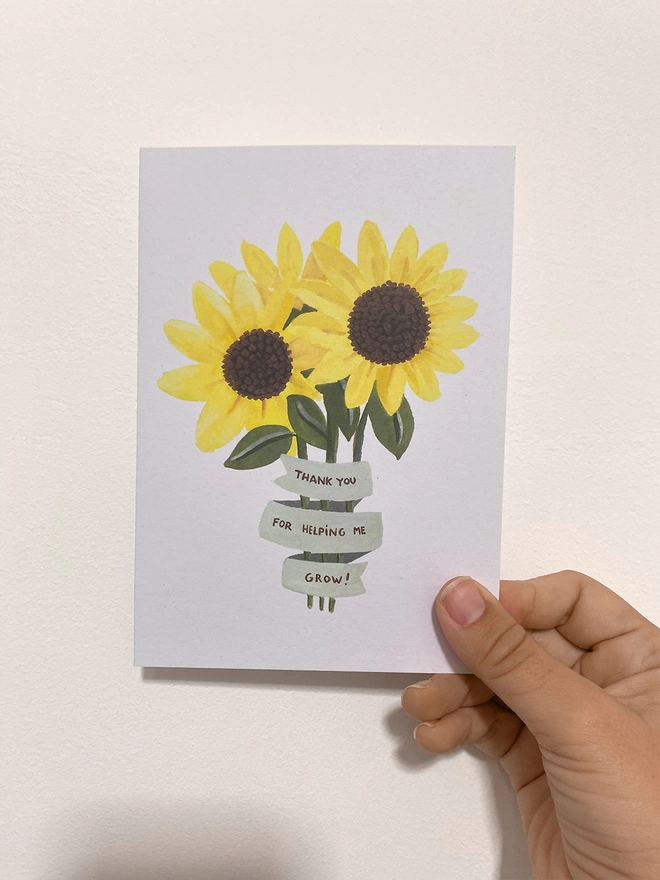 thank you flowers card in hand