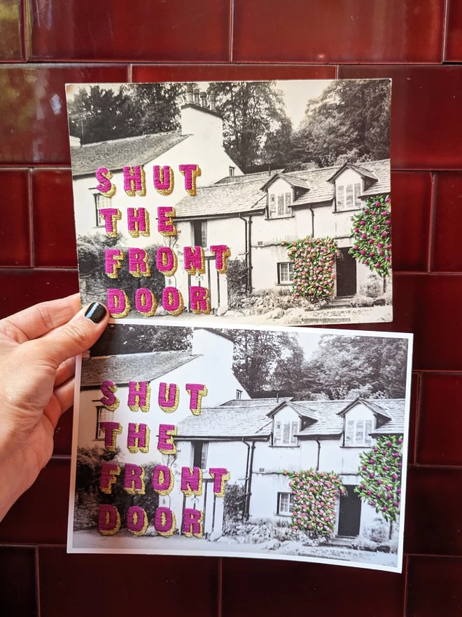 Print of Shut the front door embroidered on B&W cottage held with giclee print version