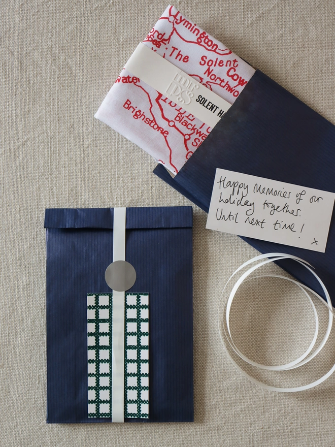 A Mr.PS red Solent Map hankie with optional gift wrapping; navy paper, white ribbon and patterned gift card