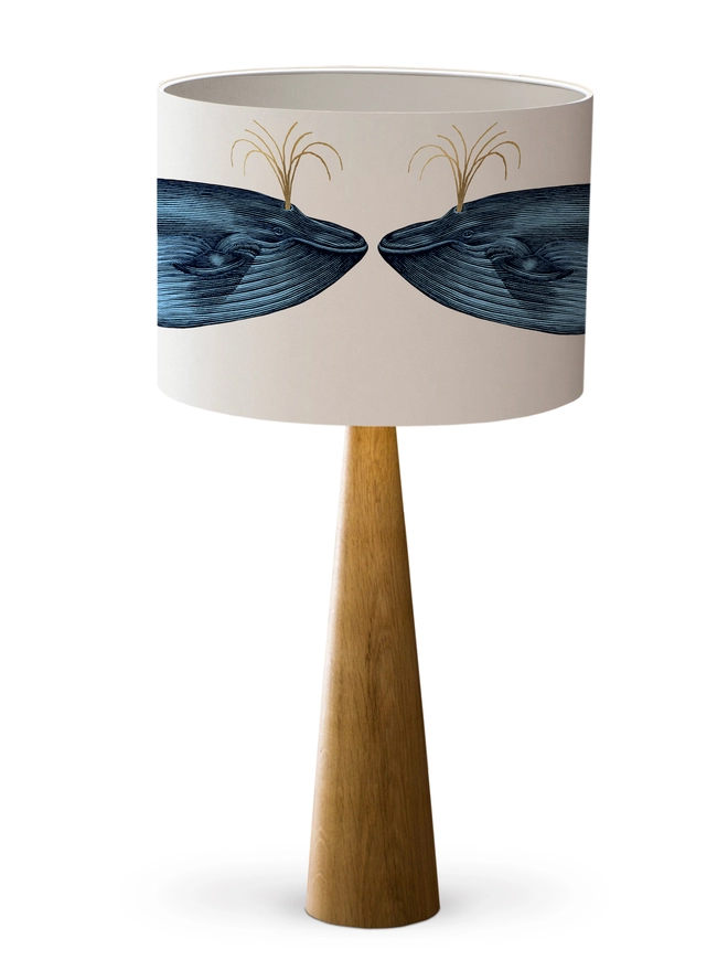 Drum Lampshade featuring the Blue Whale with a white inner on a wooden base 