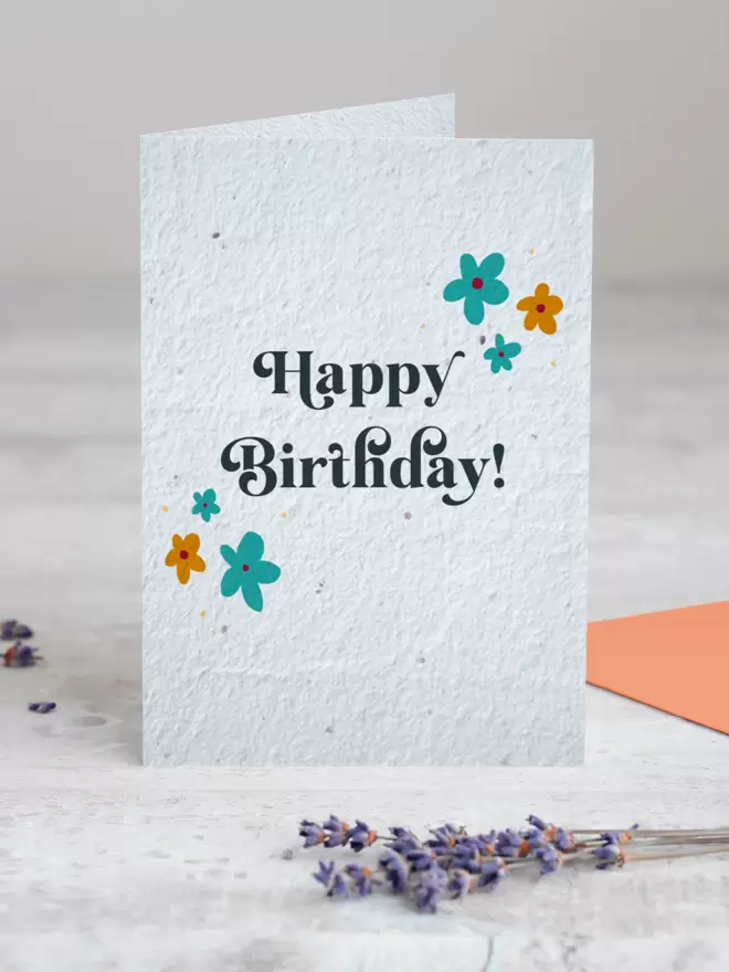 Happy Birthday Plantable Card with Floral Illustrations standing up with Lavender in front