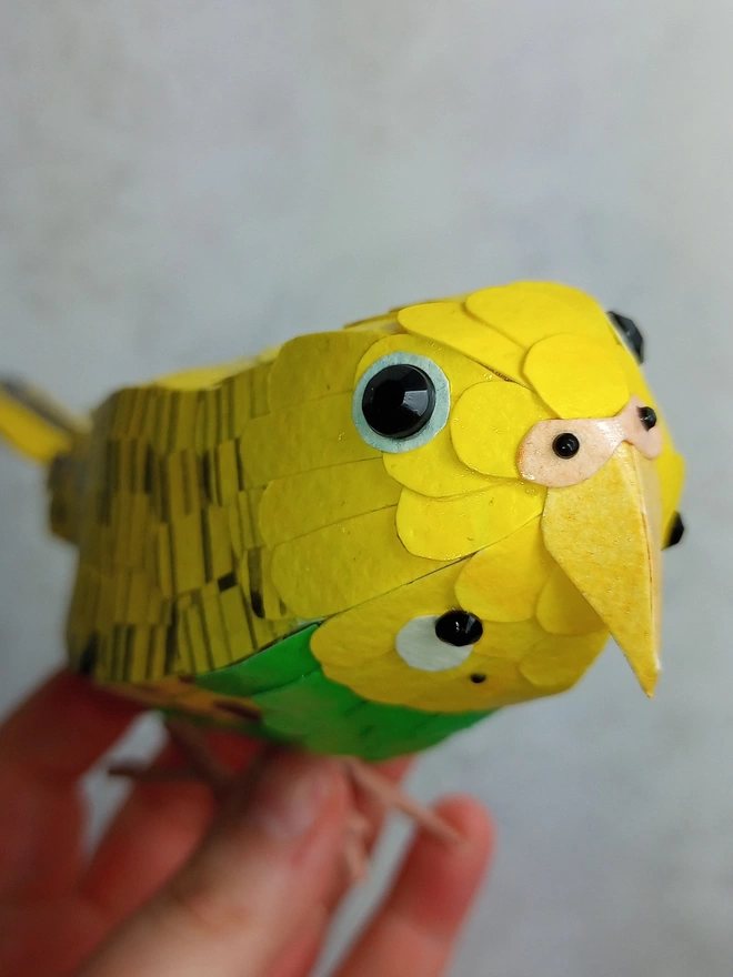 yellow budgie paper sculpture
