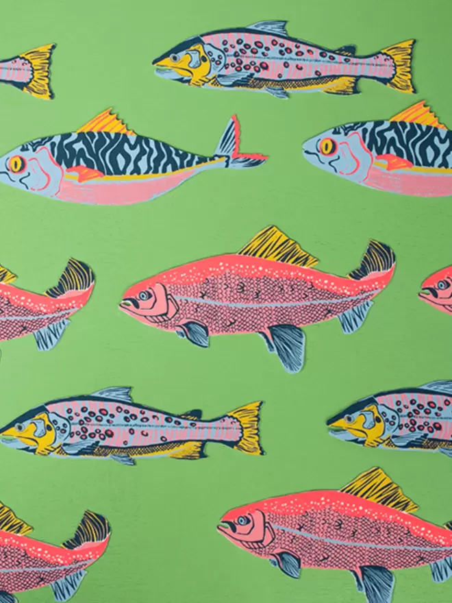 Close-up, detailed shot: all 3 different of the fish greeting cards
