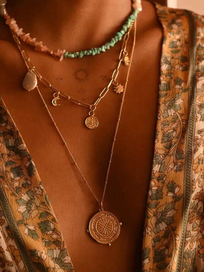 Layering charm necklaces by Loft & Daughter