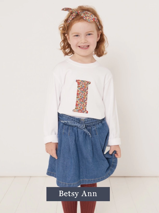 Childrens T-shirt in white with initial on the front in Betsy Ann Liberty print fabric