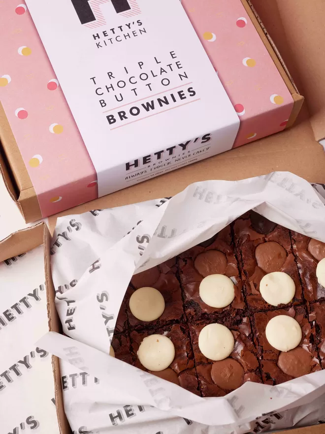 Ten slices of triple chocolate brownies packaged in branded box they come inside