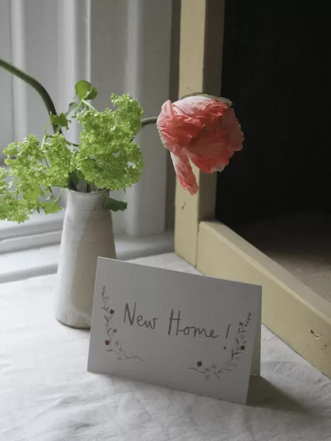 Perfectly simple new home card