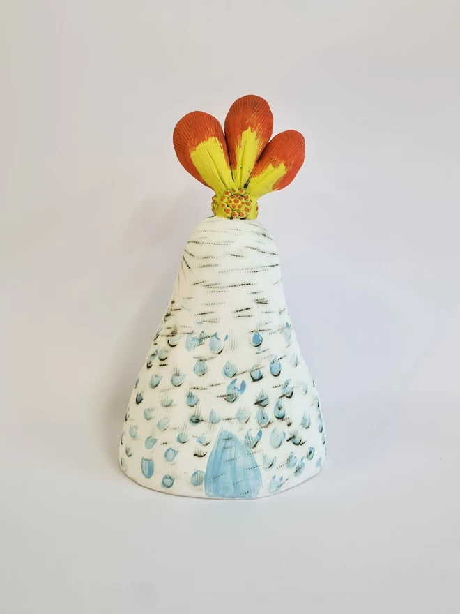 Charlotte Miller's handmade ceramic sculpture Lola the Showgirl seen from behind.
