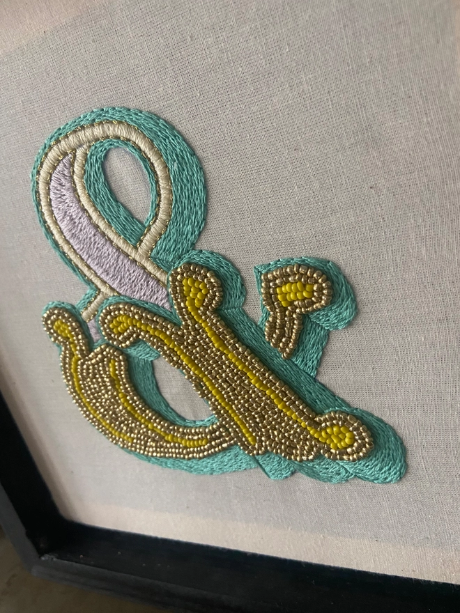 An embroidered ampersand