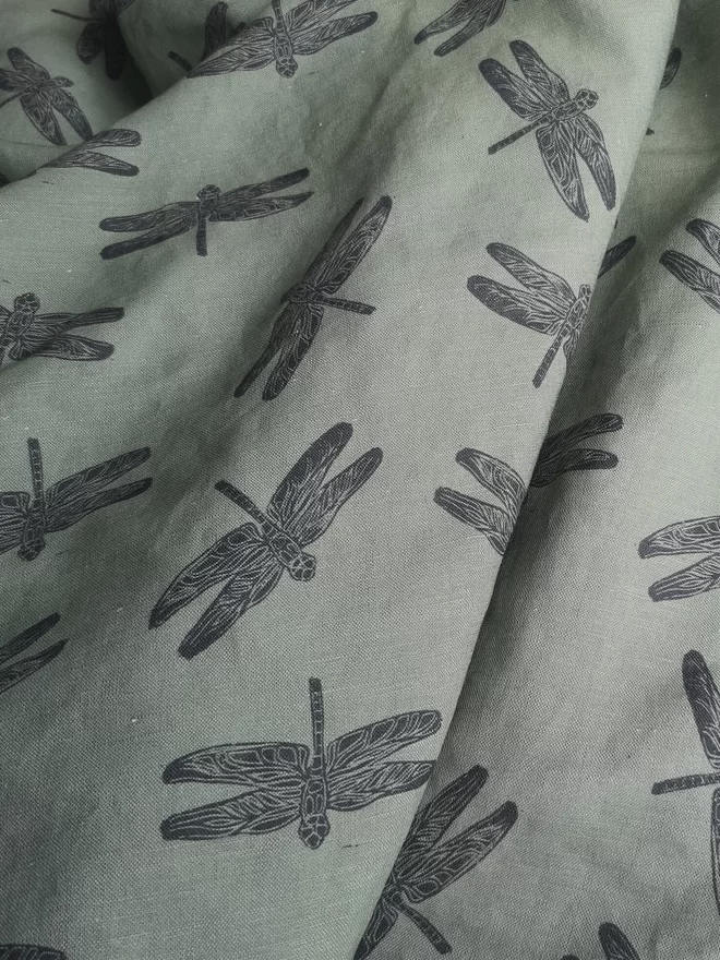Lightweight Cotton Linen green Fabric with a charcoal Dragonfly Print