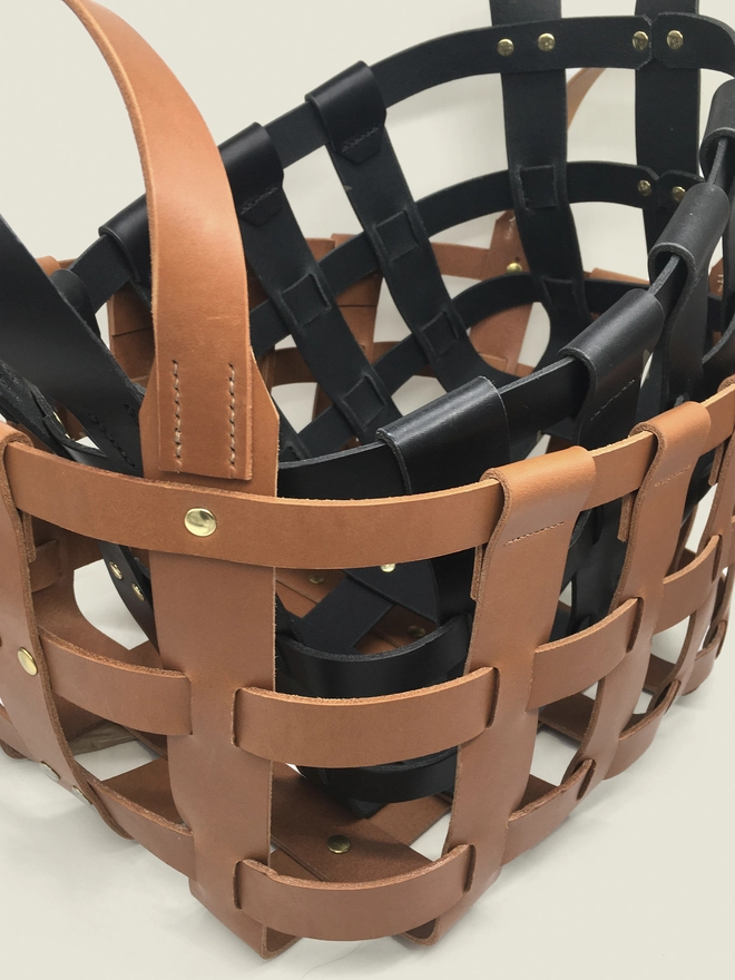 Two Leather Baskets stacked
