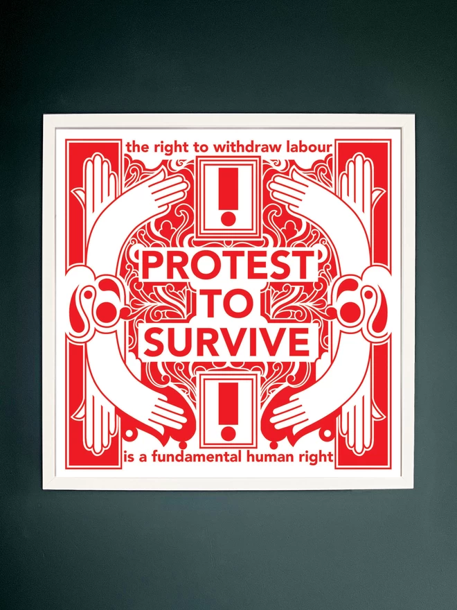 The bold red and white print with "Protest to survive" written at the centre, as well as “the right to withdraw labour” at the top, and “is a fundamental human right” at the bottom, is in a white frame hung on a dark grey wall. 