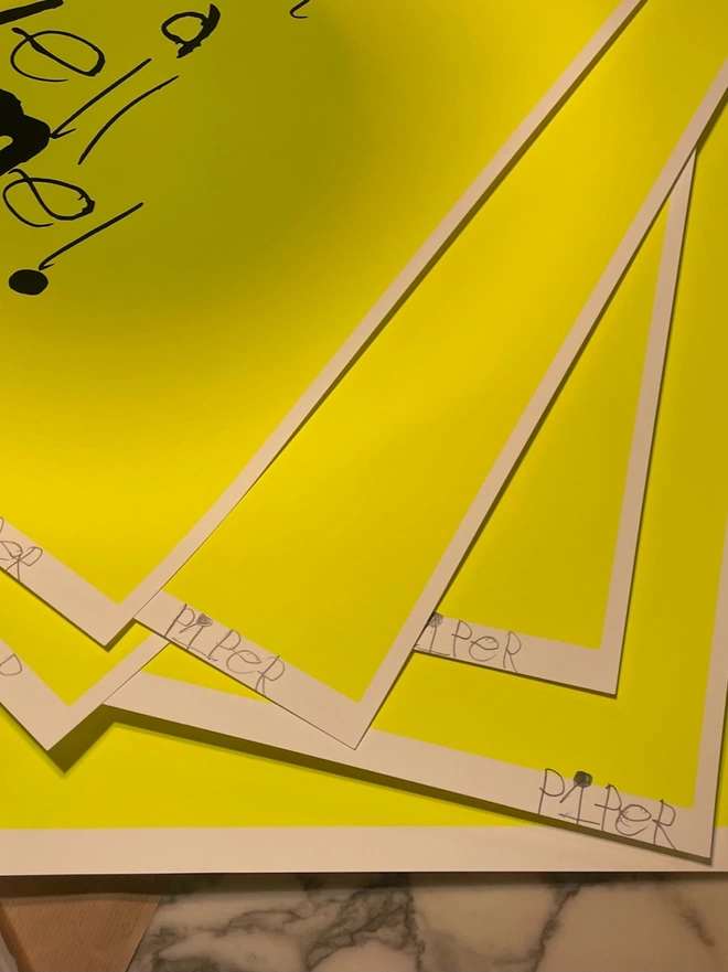 Pipers signature on her limited edition neon yellow prints