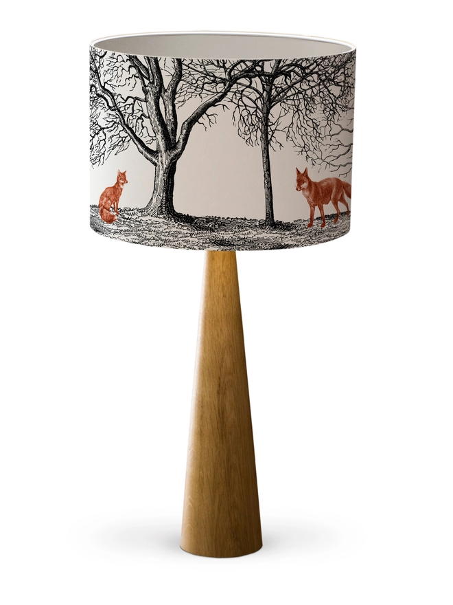 Mountain and Molehill – Foxes in winter woodland lampshade white inner on base, cut out