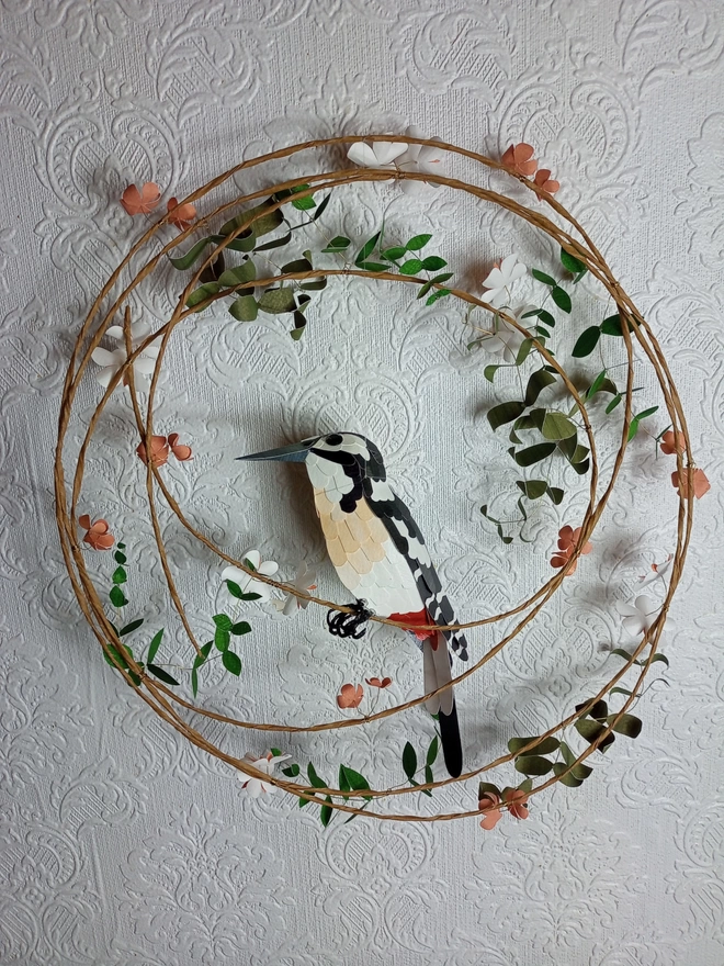 back view of woodpecker wall sculpture