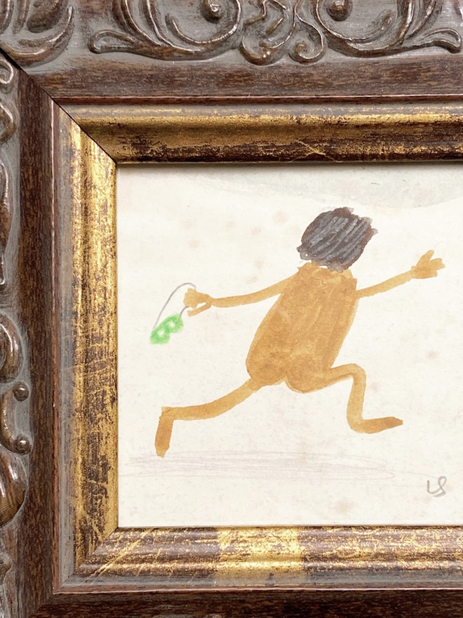 framed drawing of naked man joyfully running on the beach with green goggles 