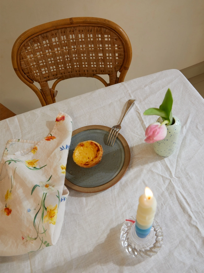 Table with linens printed with daffodils