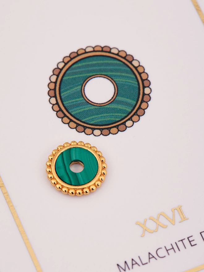 malachite disc with meaning card