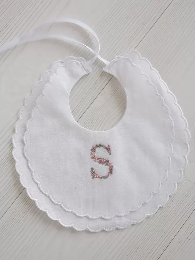 Scallop Bib with a personalised floral letter