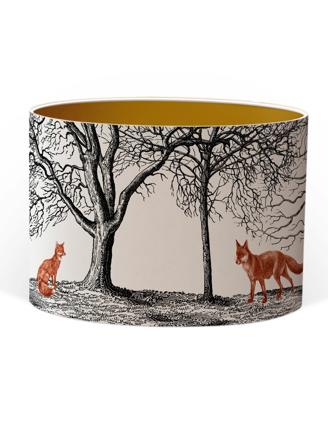 Mountain and Molehill – Foxes in winter woodland lampshade gold inner cut out