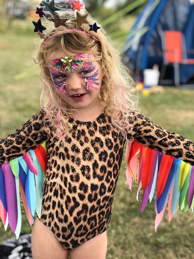 childrens leopard print leotard with gold galaxy dust. Long sleeves and Rainbow feather effect wings