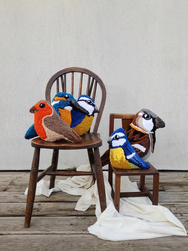 Flock of Hand Made Textile Birds on Chairs