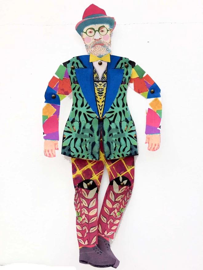 Made up articulated Matisse puppet on white background