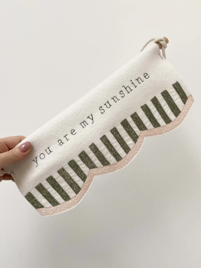 You Are My Sunshine Stripe Scallop Felt Banner being held