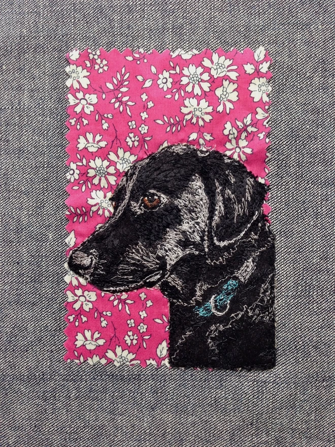 embroidered pet portrait of a black labrador