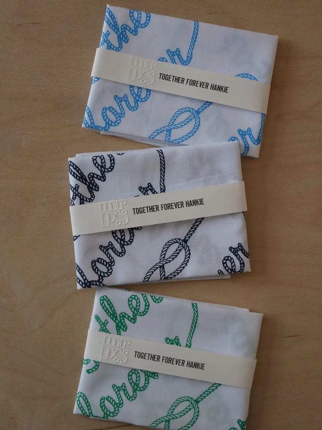 Three folded Mr.PS Together Forever rope writing hankies to show the colour options available: sky blue, midnight blue, spring green